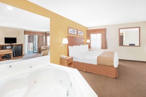 Suite, 1 King Bed | In-room safe, rollaway beds, free WiFi, bed sheets