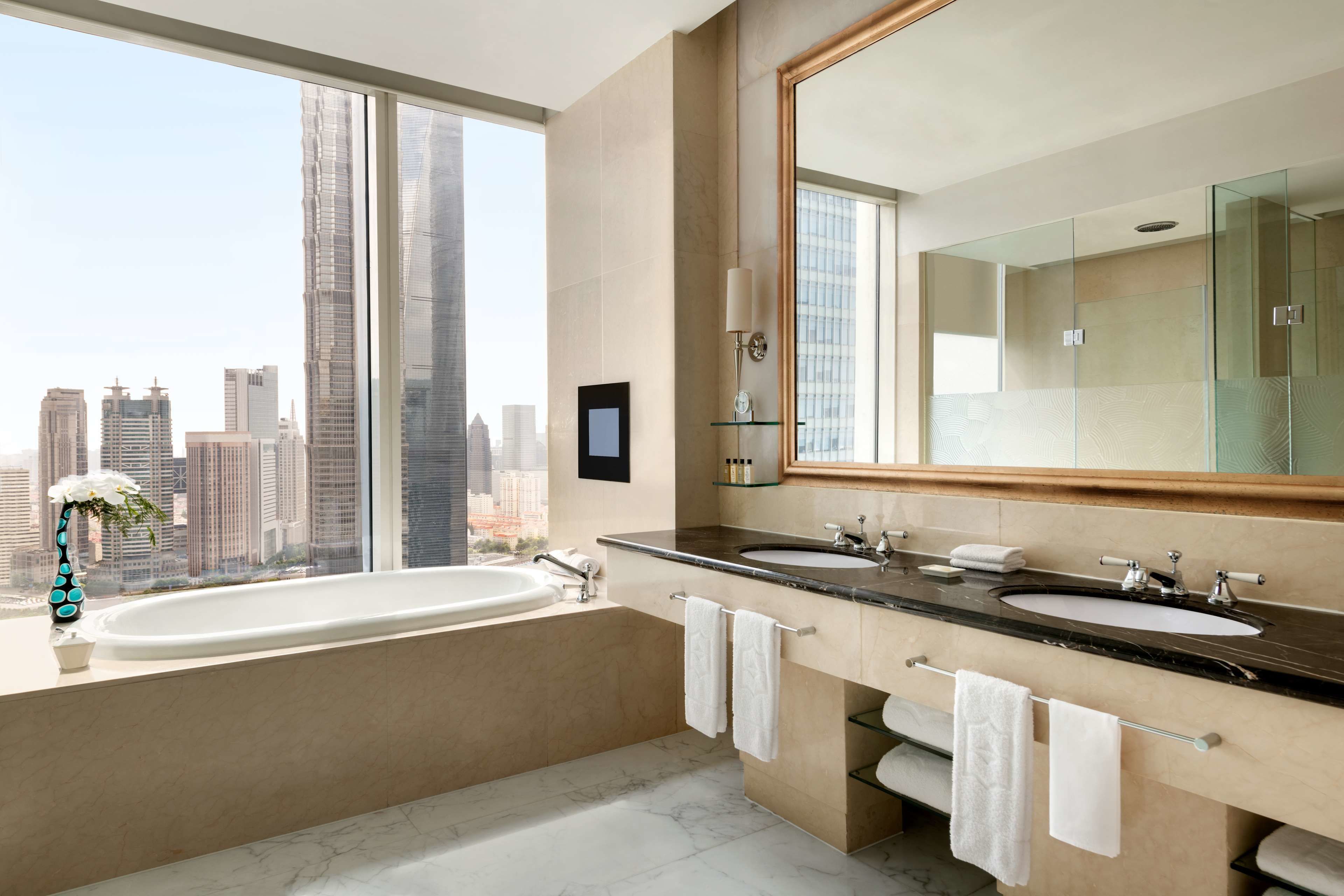 presidential suite (grand tower) | bathroom | separate bathtub and shower, rainfall showerhead, hair dryer, bathrobes