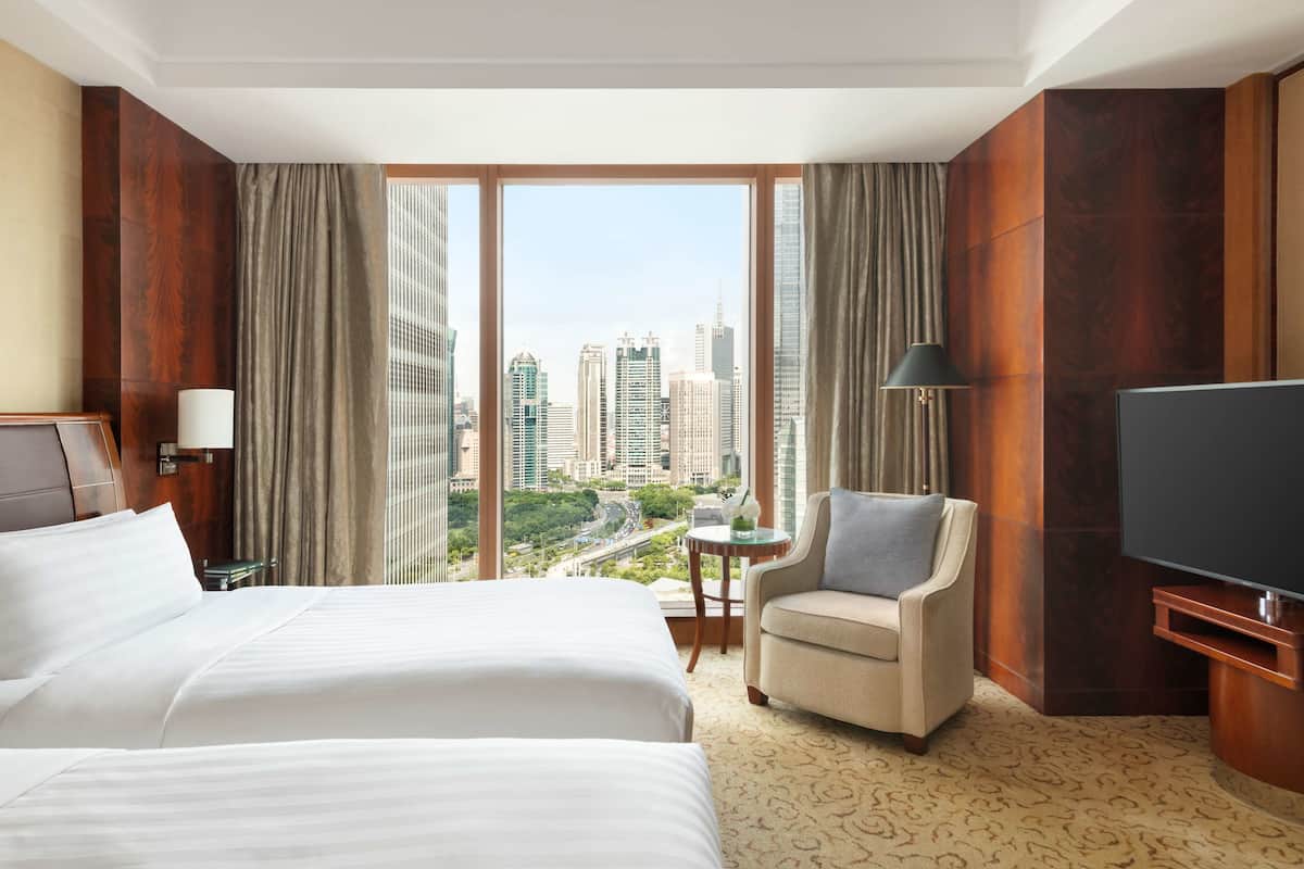 Egyptian cotton sheets, premium bedding, down duvets, in-room safe