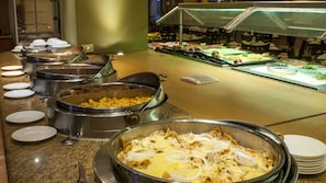 Breakfast, lunch served; local and international cuisine, pool views