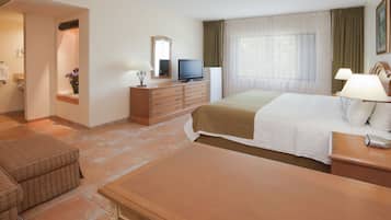 Suite, 1 King Bed | In-room safe, desk, soundproofing, iron/ironing board