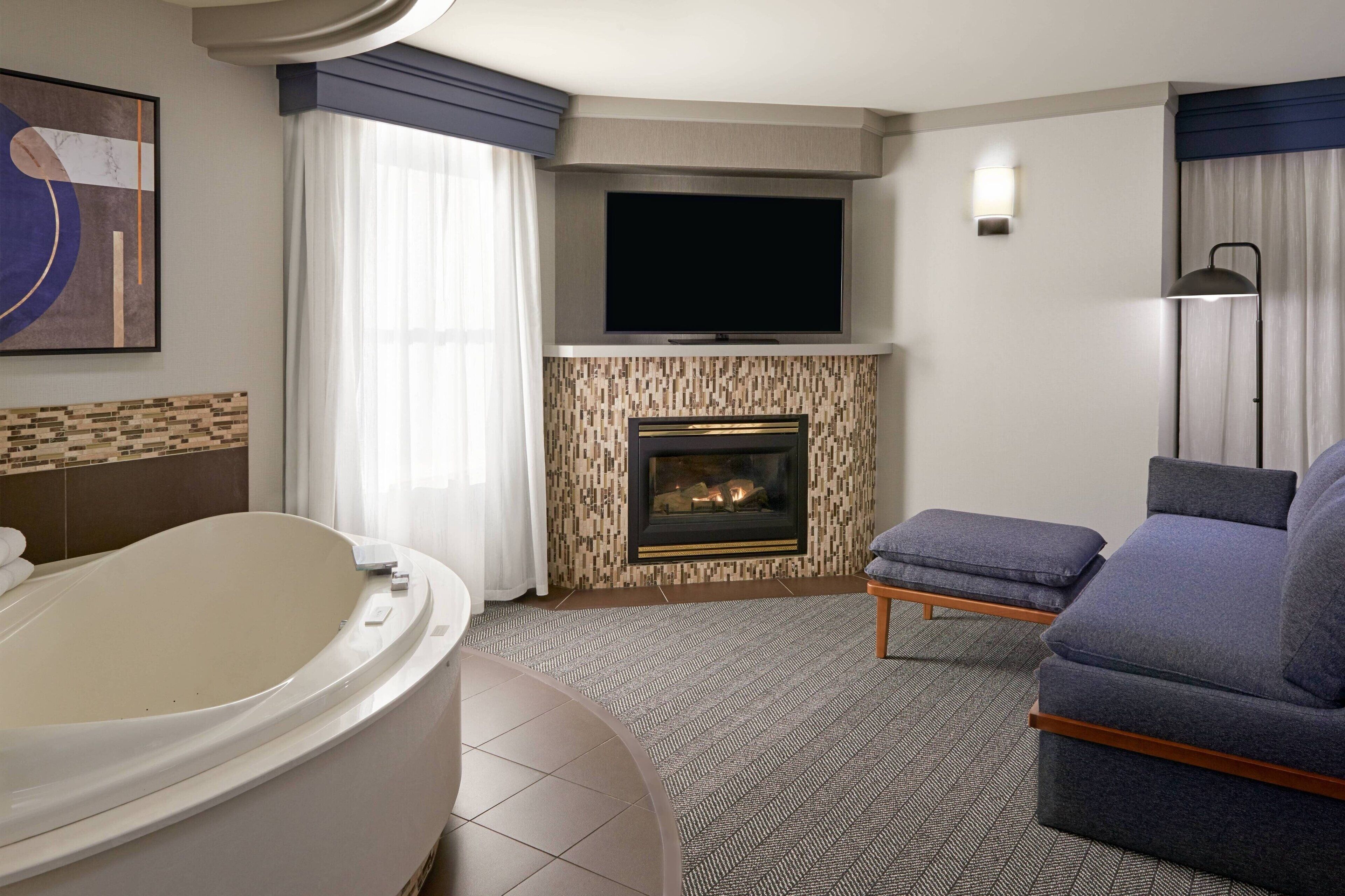 room, 1 king bed with sofa bed, fireplace | pool