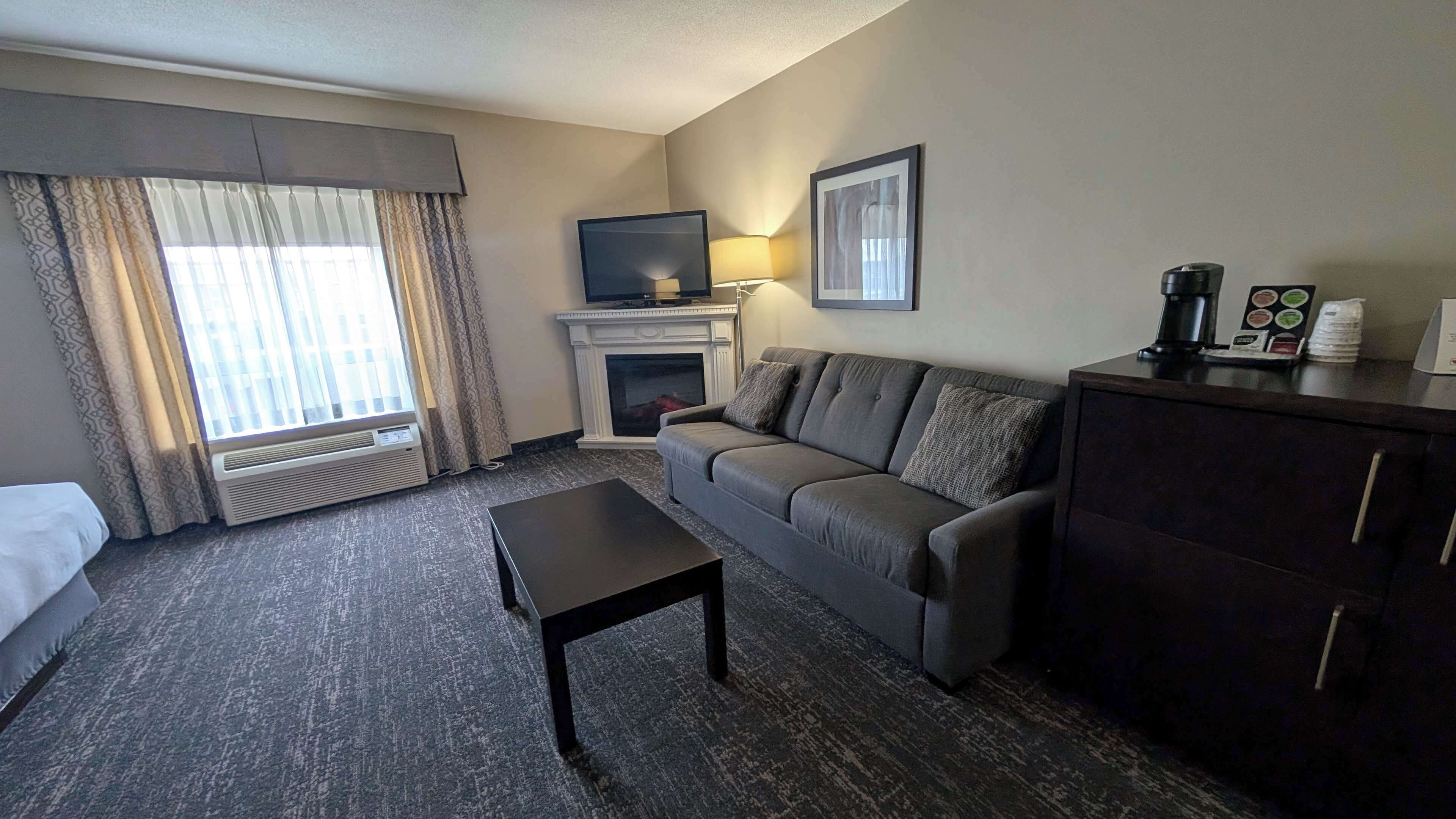 standard room, 2 queen beds, non smoking, fireplace (with sofabed) | 1 bedroom, iron/ironing board, rollaway beds, internet