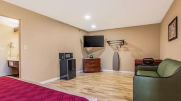 Suite, 1 King Bed with Sofa bed, Non Smoking | Iron/ironing board, free cribs/infant beds, rollaway beds, free WiFi
