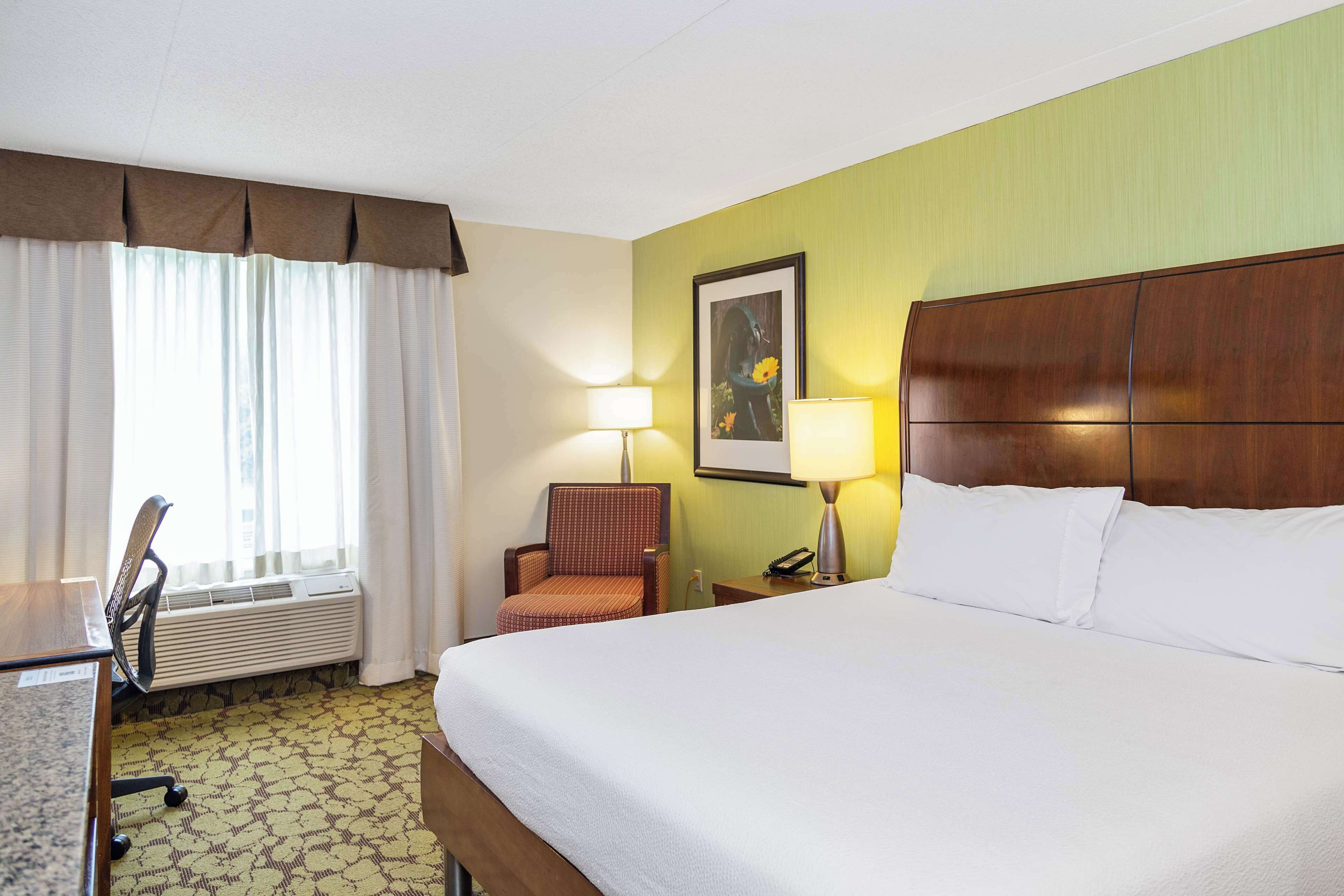 deluxe room, 1 king bed | desk, laptop workspace, blackout curtains, iron/ironing board