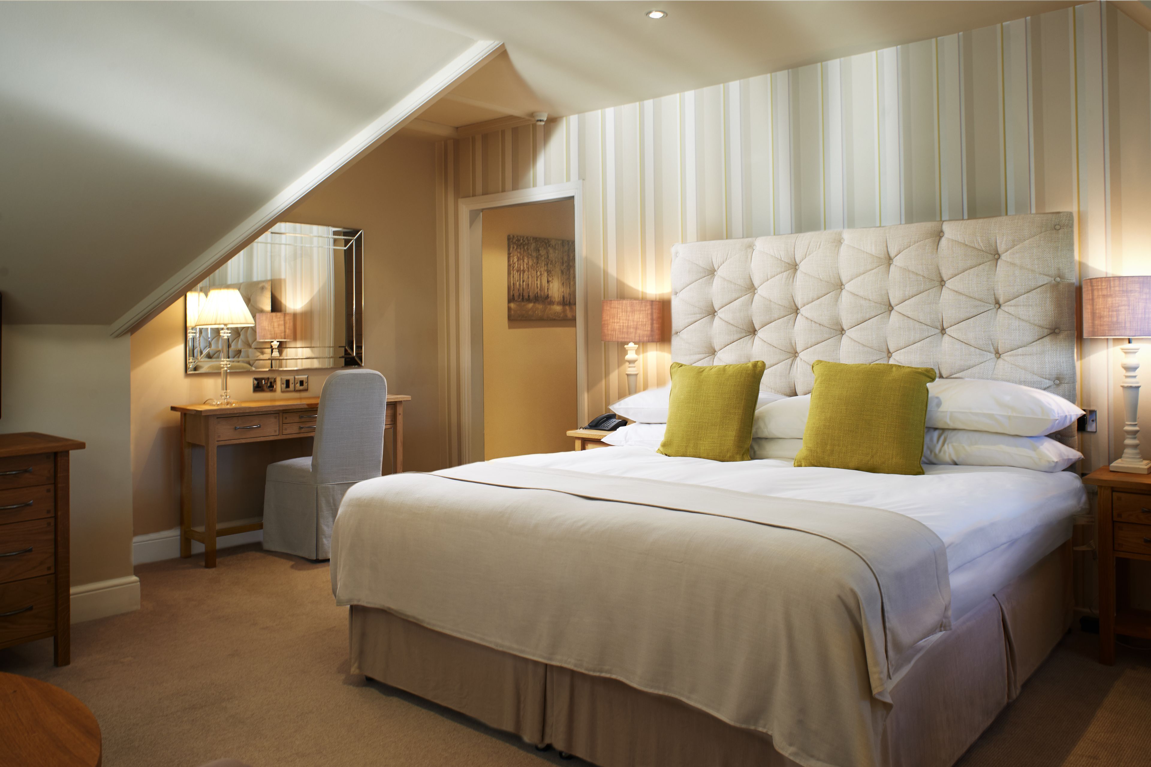 deluxe room | in-room safe, desk, iron/ironing board, cots/infant beds