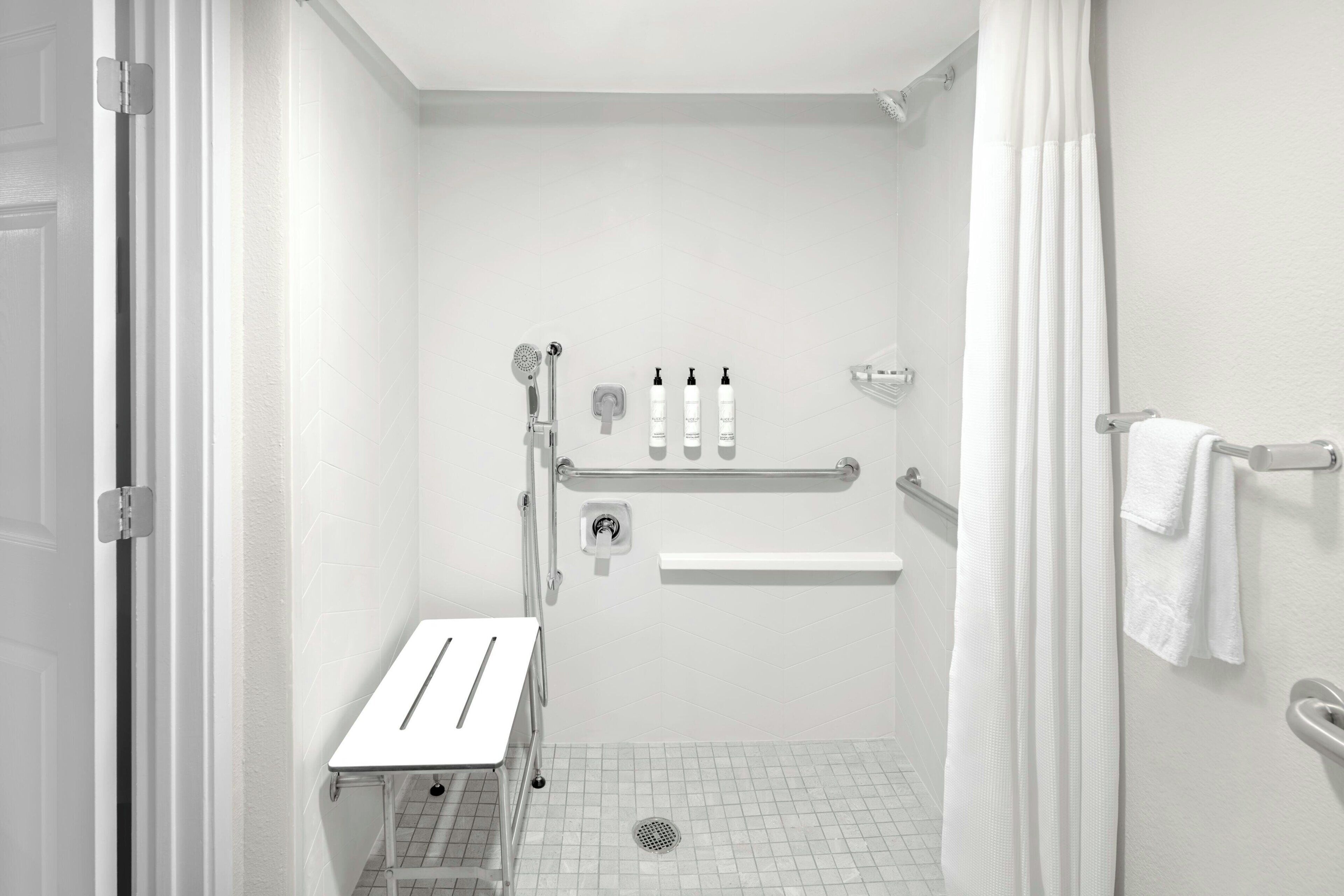 combined shower/bathtub, free toiletries, hair dryer, towels