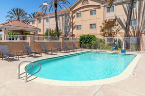 Outdoor pool, open 6:00 AM to 10:00 PM, sun loungers