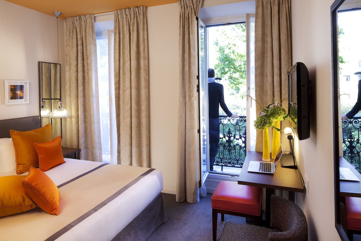 In-room safe, individually decorated, desk, blackout curtains