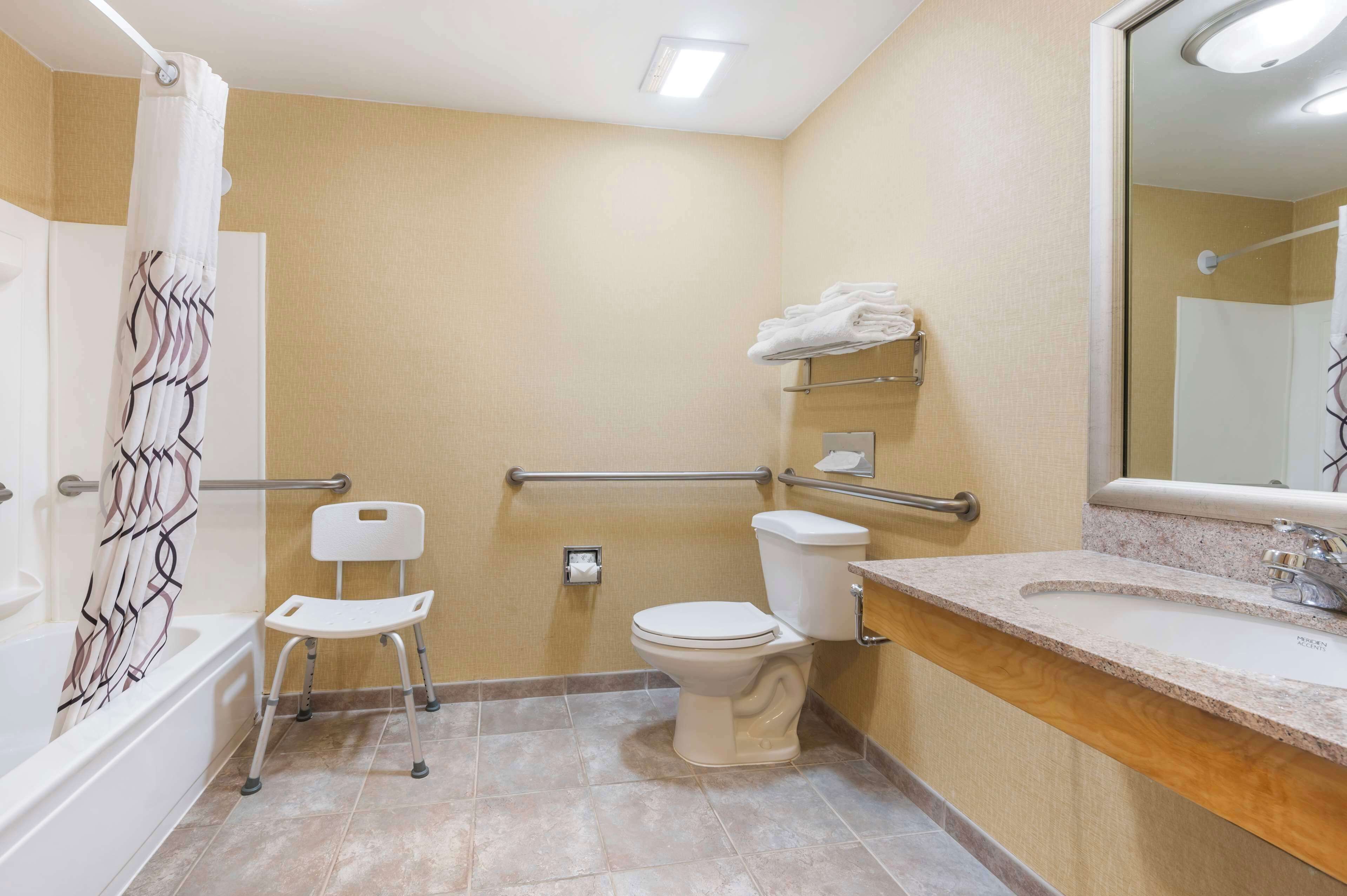 hydromassage showerhead, hair dryer, towels