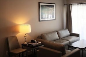 Deluxe Suite, 1 Bedroom, Kitchenette | Living room | 32-inch flat-screen TV with digital channels, TV