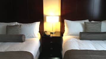 Premium bedding, pillow-top beds, desk, blackout curtains