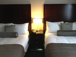 Premium bedding, pillowtop beds, desk, blackout drapes
