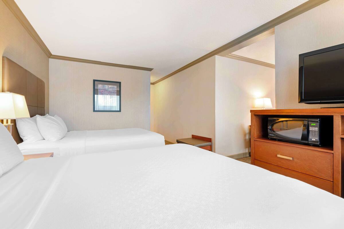 suite, 2 queen beds, non smoking, refrigerator & microwave (with sofabed) | premium bedding, iron/ironing board, free wifi, bed sheets