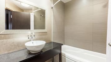 Economy Room, 2 Queen Beds | Bathroom | Combined shower/tub, eco-friendly toiletries, hair dryer, towels