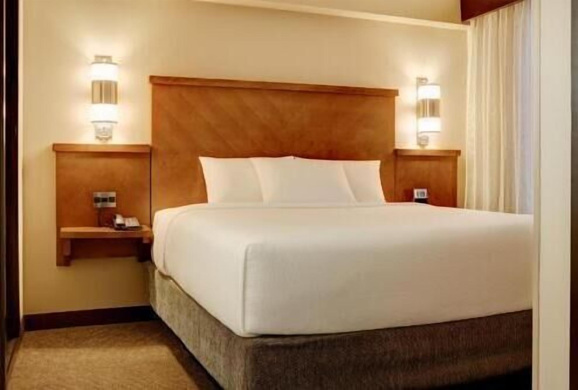 Premium bedding, desk, blackout drapes, iron/ironing board