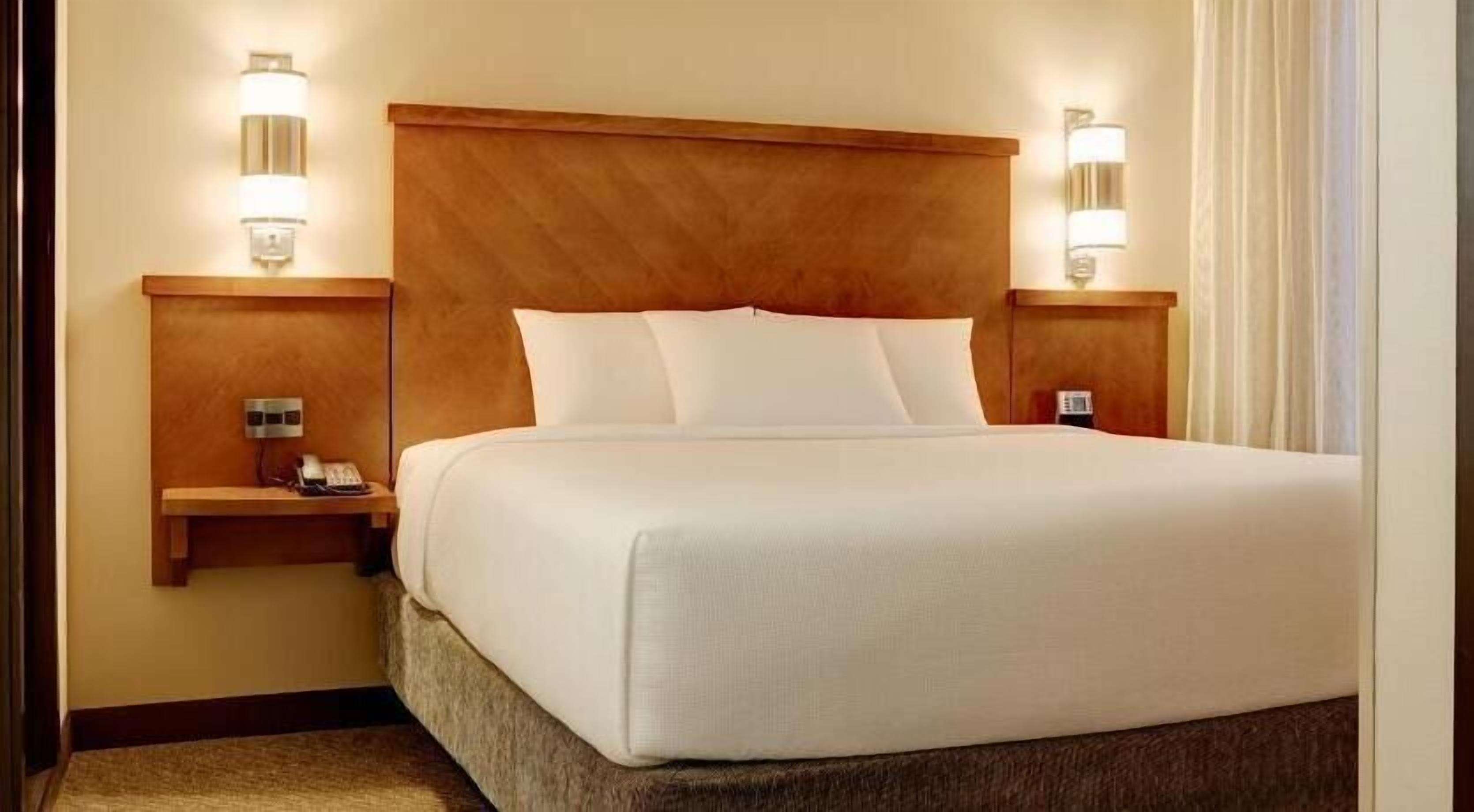 Premium bedding, desk, blackout drapes, iron/ironing board