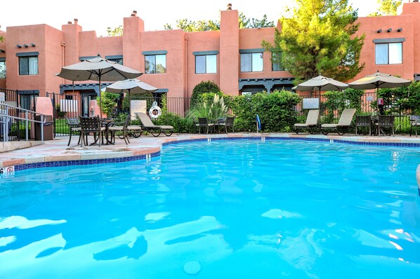 Outdoor pool, open 8 AM to 9 PM, pool umbrellas, sun loungers