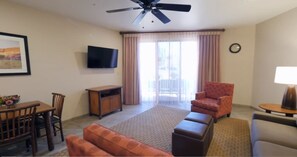 Standard Suite, 1 Bedroom | Living room | TV, DVD player