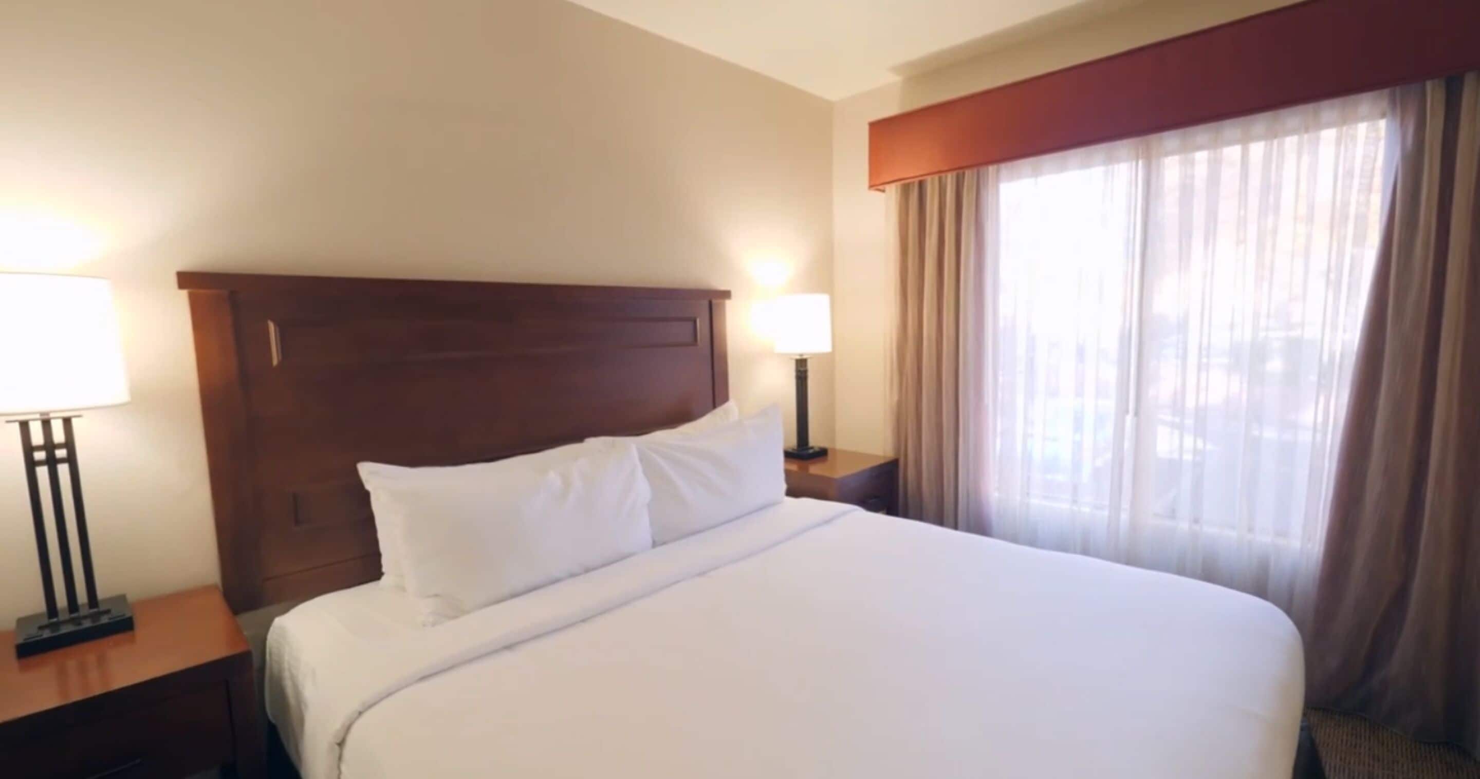 in-room safe, desk, blackout curtains, iron/ironing board