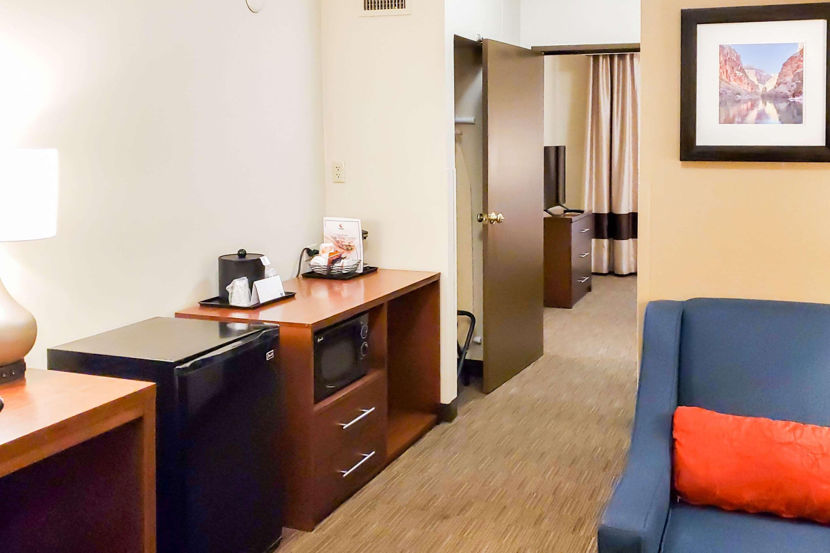 suite, 1 queen bed, living room, sofa, roll-in shower, accessible, non smoking | premium bedding, desk, laptop workspace, blackout curtains