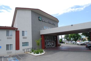 A building with a sign reading "Quality Inn & Suites."