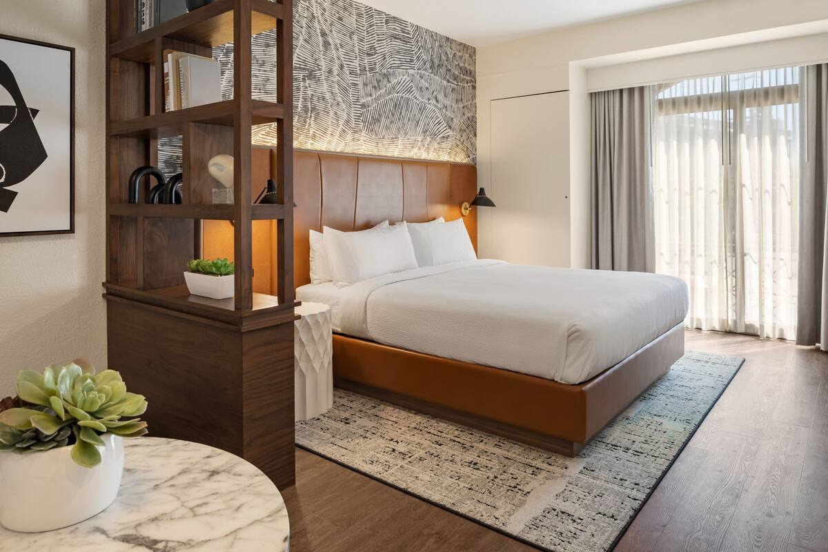 Hypo-allergenic bedding available, in-room safe, desk, laptop workspace