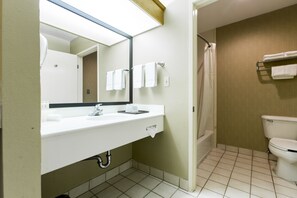 Suite, 1 King Bed | Bathroom | Combined shower/bathtub, free toiletries, hair dryer, towels