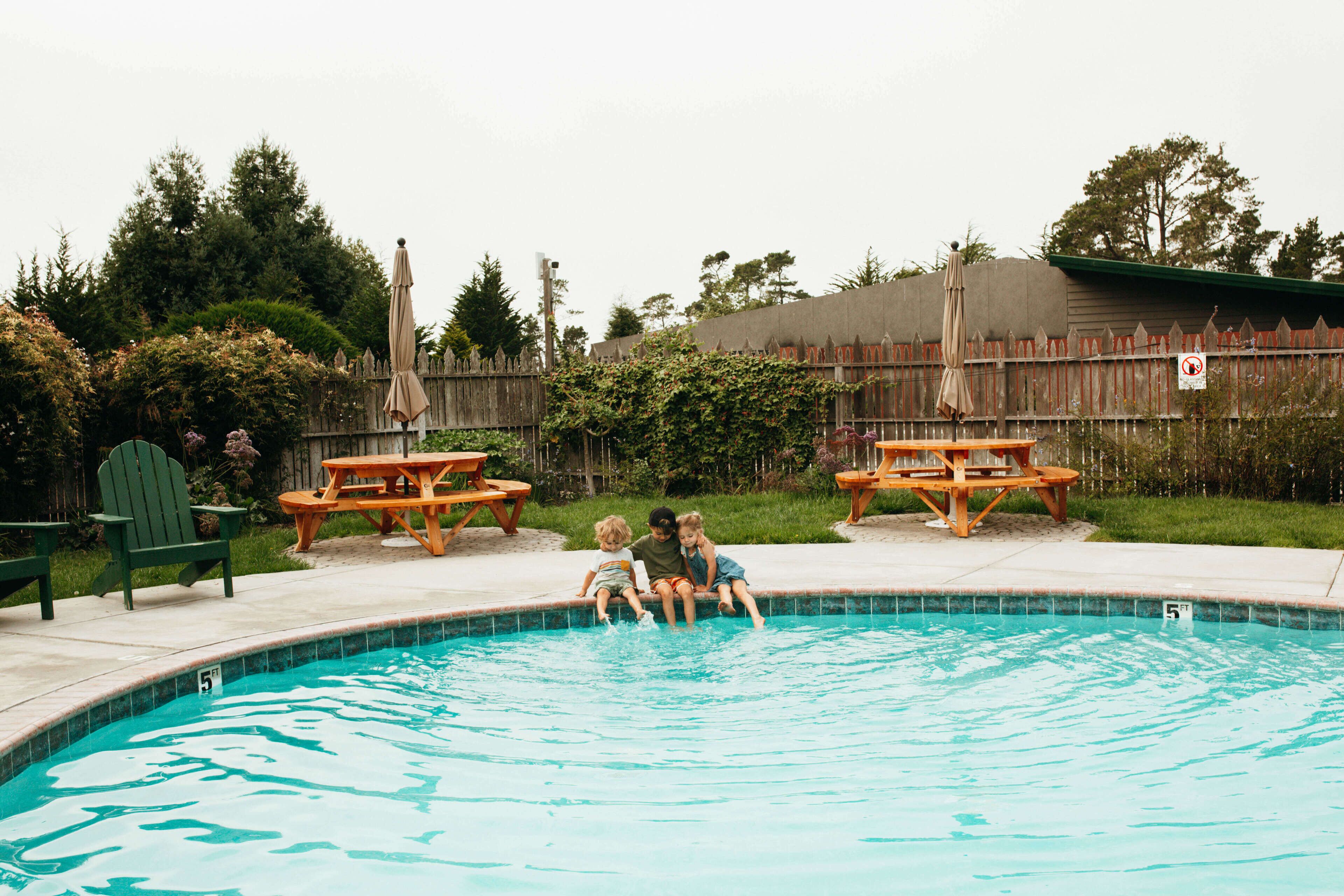 outdoor pool, a heated pool, pool loungers