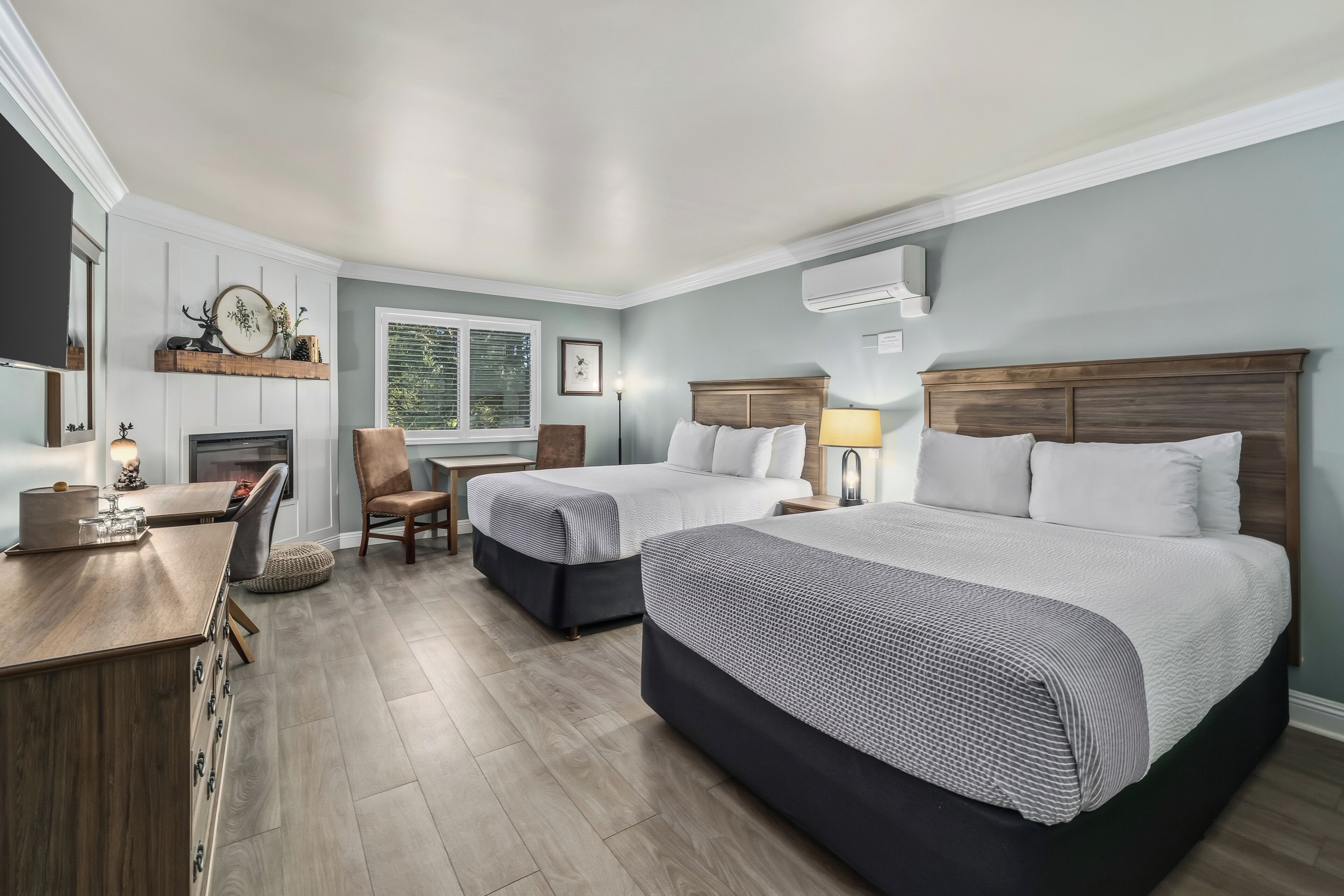 Deluxe Room, 2 Queen Beds | Down comforters, desk, iron/ironing board, free WiFi