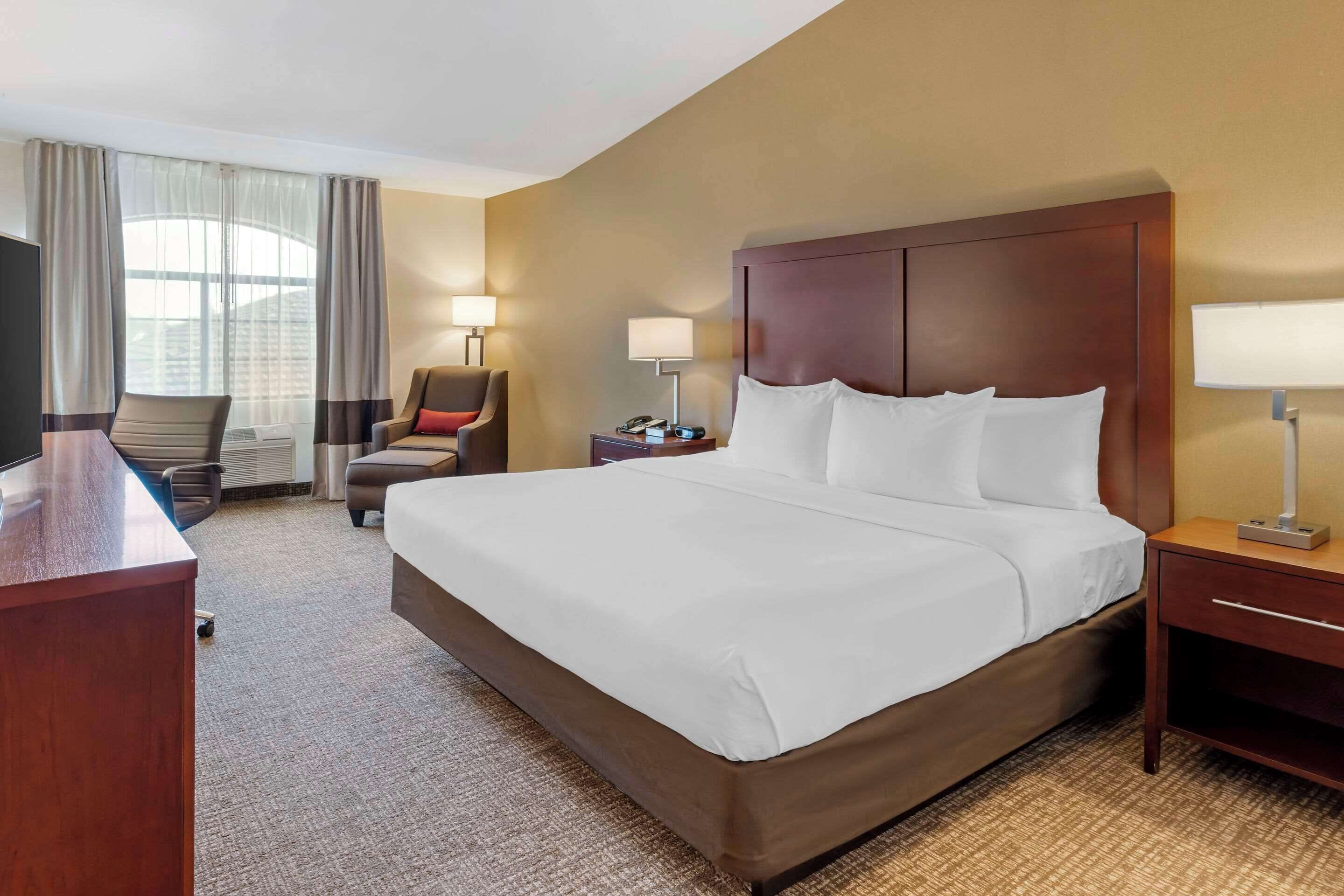 desk, laptop workspace, blackout curtains, iron/ironing board