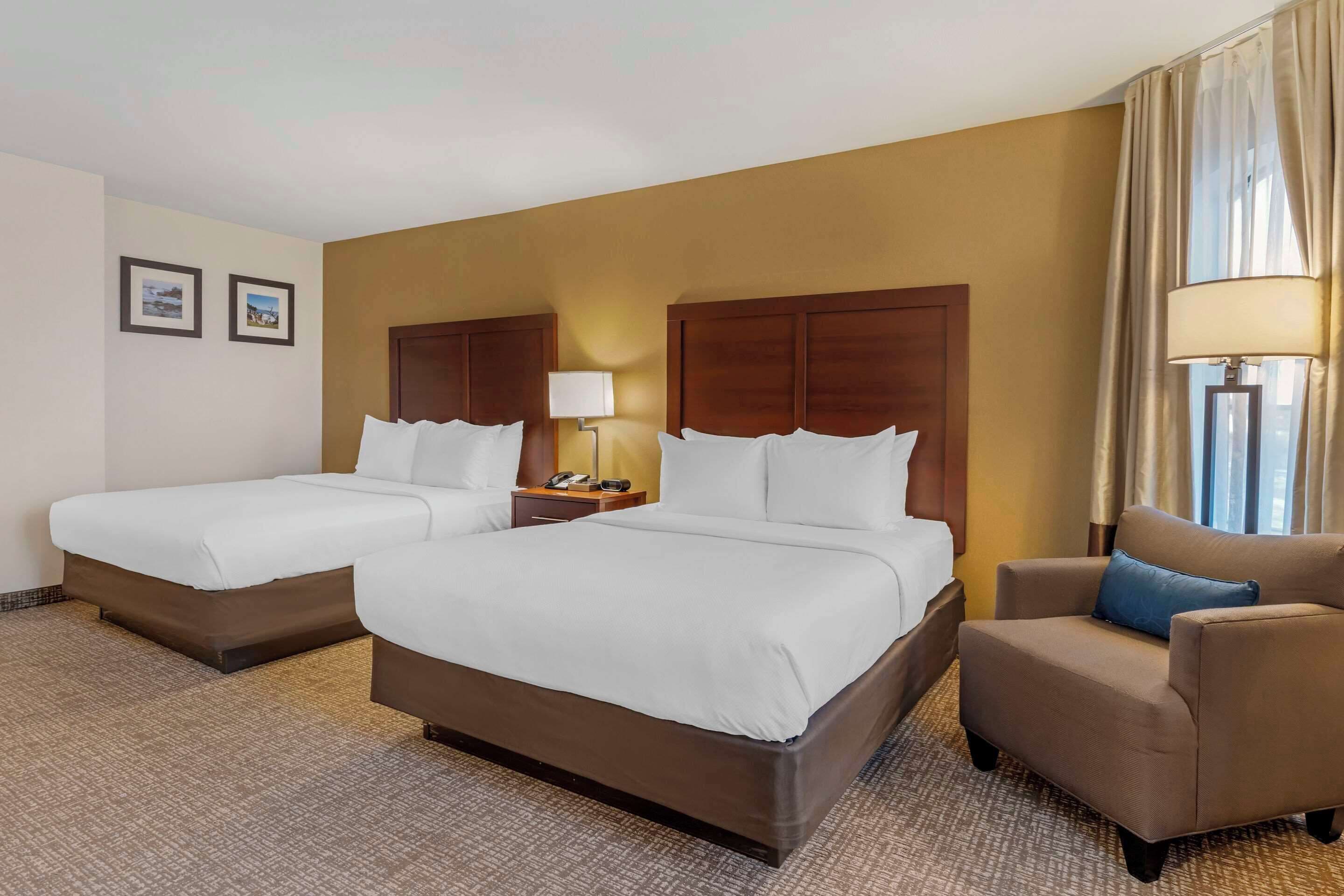 suite, 2 queen beds, non smoking | desk, laptop workspace, blackout curtains, iron/ironing board