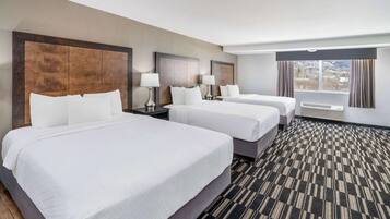 Quarto luxo, várias camas, para não fumantes | Camas com colchões pillow-top, individualmente mobiliados