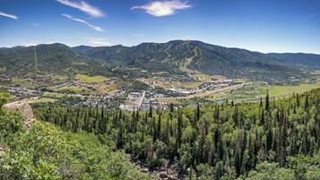 A mountainous landscape with a town nestled in the valley.