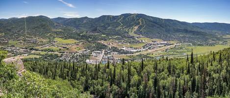 A mountainous landscape with a town nestled in the valley.