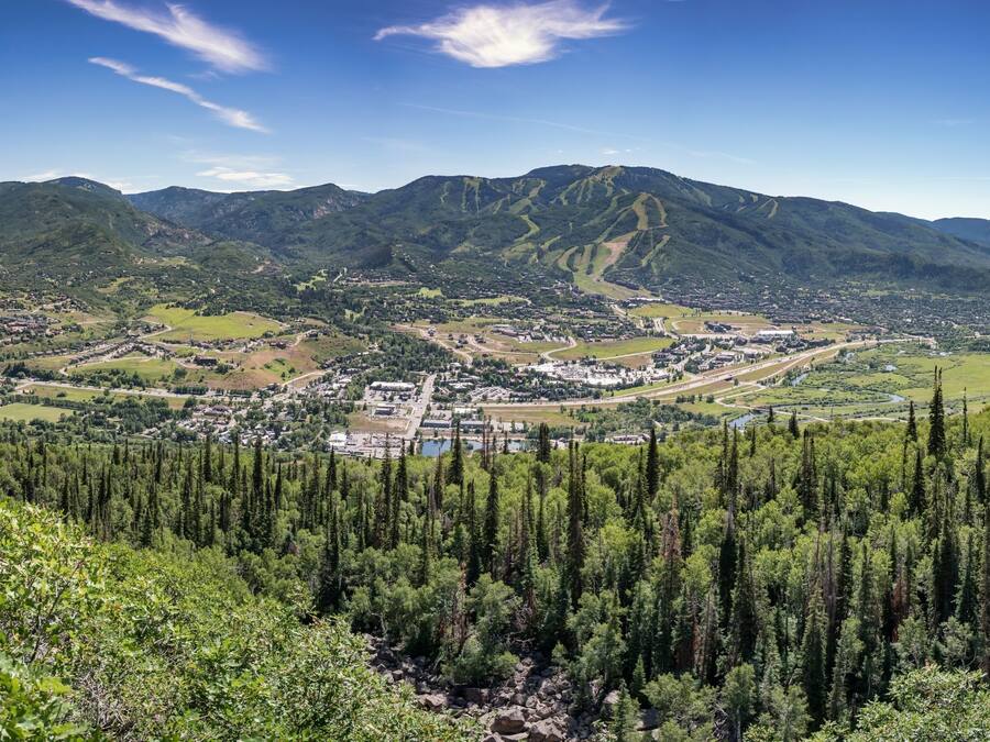 A mountainous landscape with a town nestled in the valley.