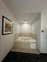 Suite, 1 King Bed, Non Smoking, Hot Tub | In-room safe, desk, blackout drapes, soundproofing