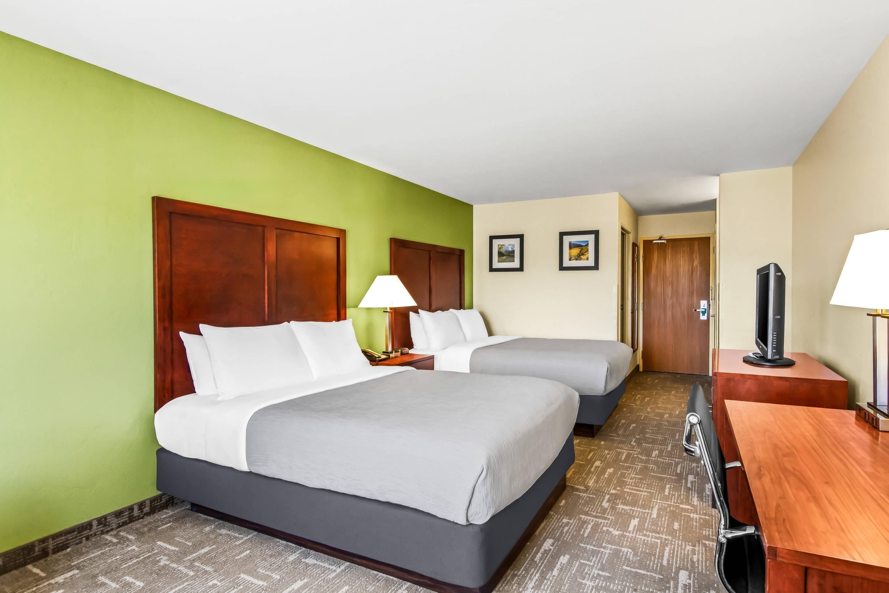 standard room, 2 queen beds, non smoking | iron/ironing board, free cots/infant beds, free wifi, bed sheets