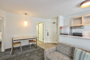 Suite, 2 Bedrooms | Living area | 32-inch Smart TV with satellite channels, TV, Netflix