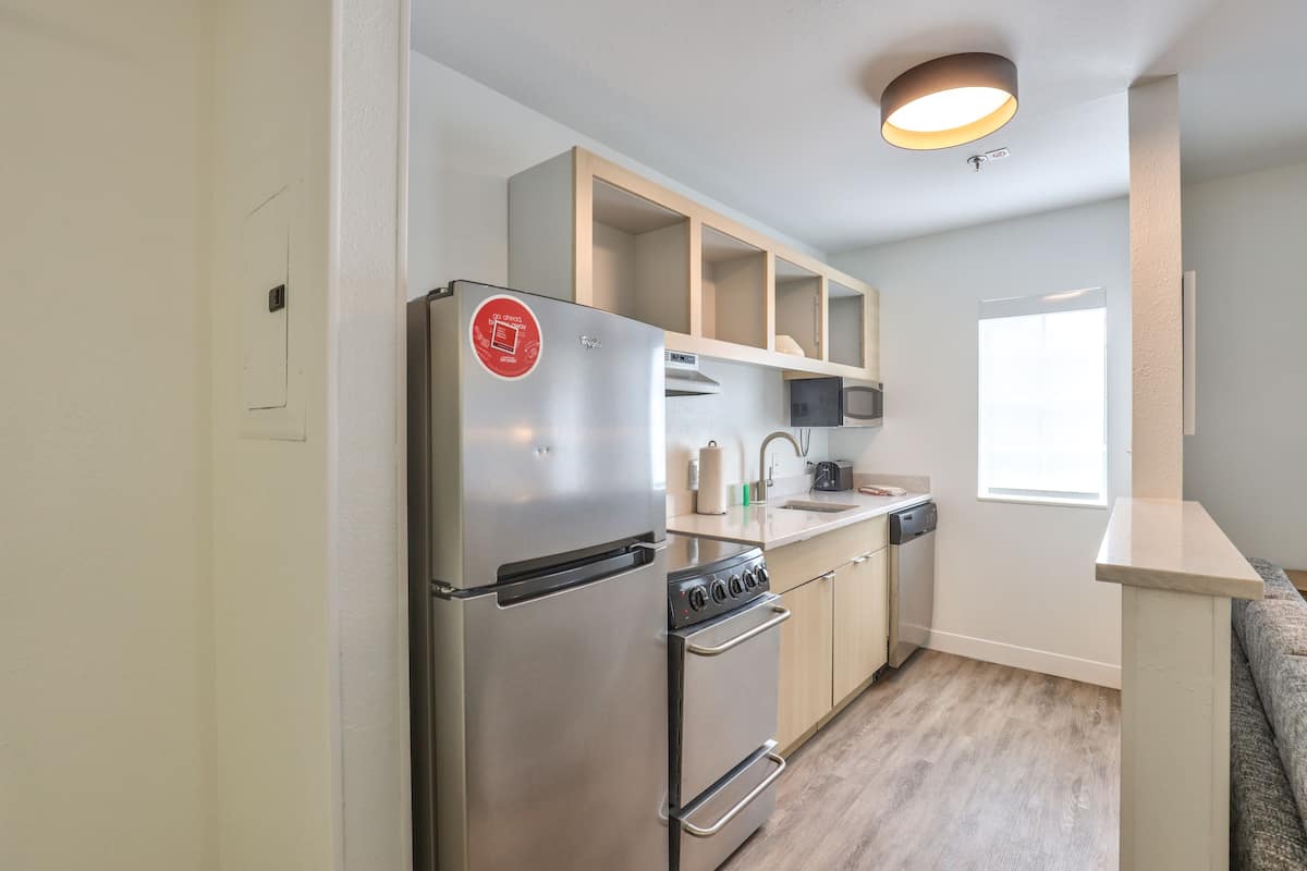 suite, 2 bedrooms | private kitchen | fridge, microwave, stovetop, dishwasher
