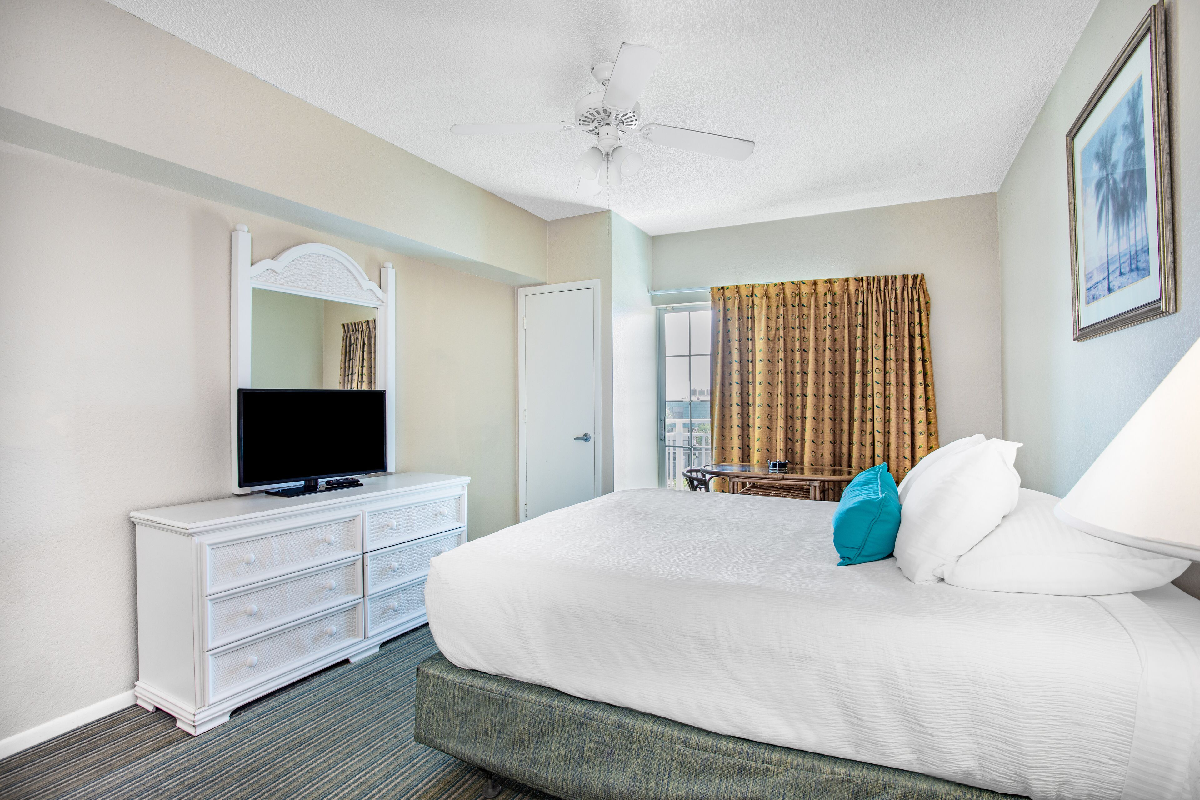 pillow-top beds, iron/ironing board, bed sheets, alarm clocks