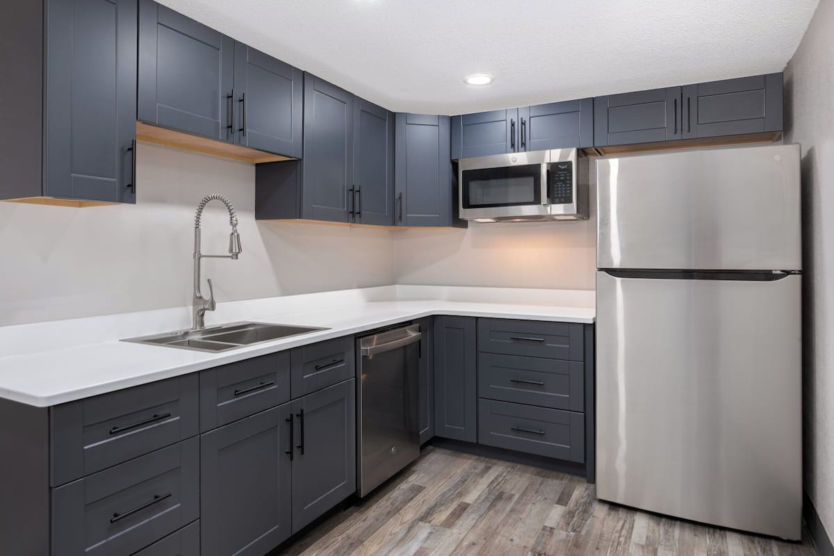 suite, 1 bedroom, kitchenette | 1 bedroom, desk, iron/ironing board, free wifi