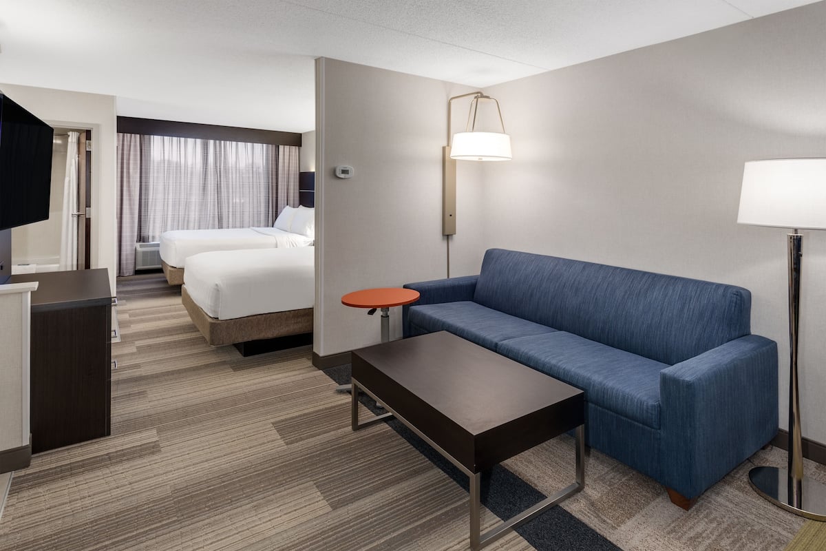 Suite, 2 Double Beds (Additional Living Area) | In-room safe, desk, iron/ironing board, free cribs/infant beds