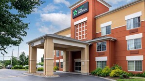 A hotel with a sign reading "extended STAY AMERICA" and a covered entrance. - Extended Stay America Suites Boston Marlborough (Marlborough)