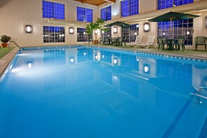 Indoor pool, open 9:00 AM to 11:30 PM, pool loungers