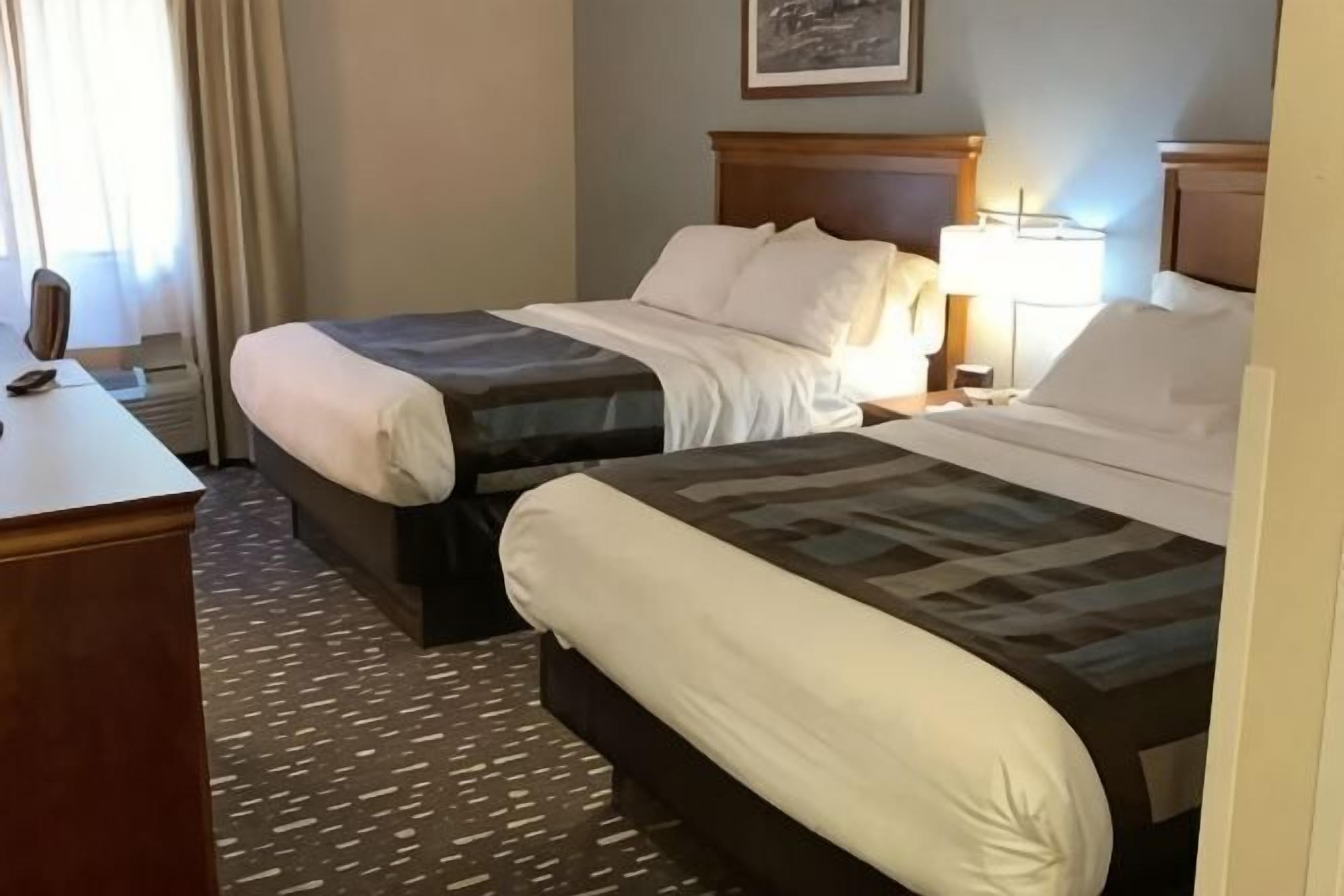 Desk, laptop workspace, blackout drapes, iron/ironing board