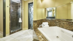 Combined shower/tub, deep soaking tub, free toiletries, hair dryer