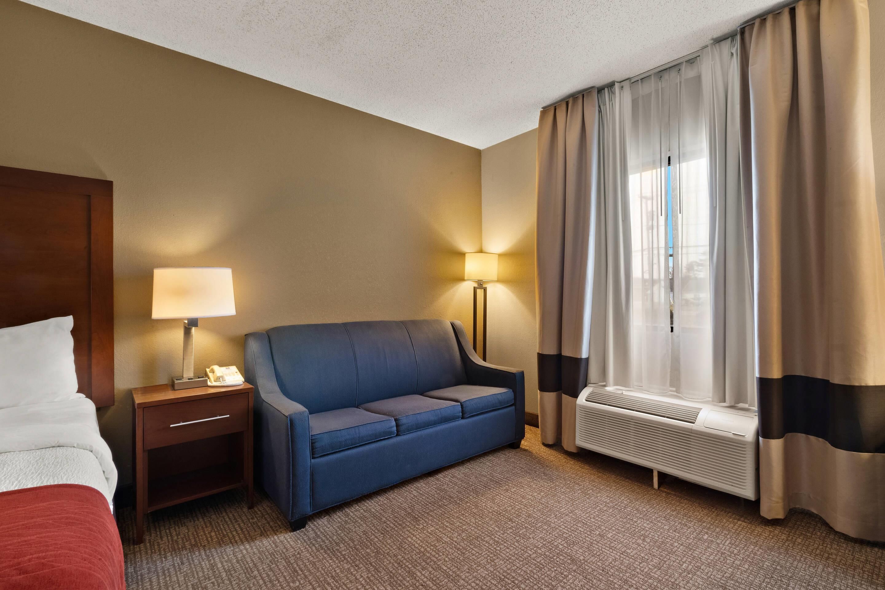 Room, 1 King Bed, Non Smoking, Jetted Tub | In-room safe, desk, iron/ironing board, free WiFi