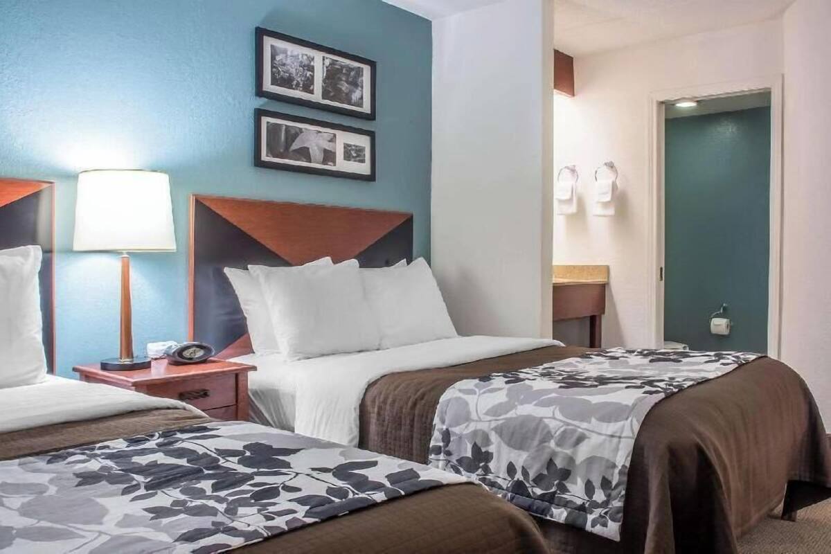 Desk, blackout drapes, iron/ironing board, free cribs/infant beds