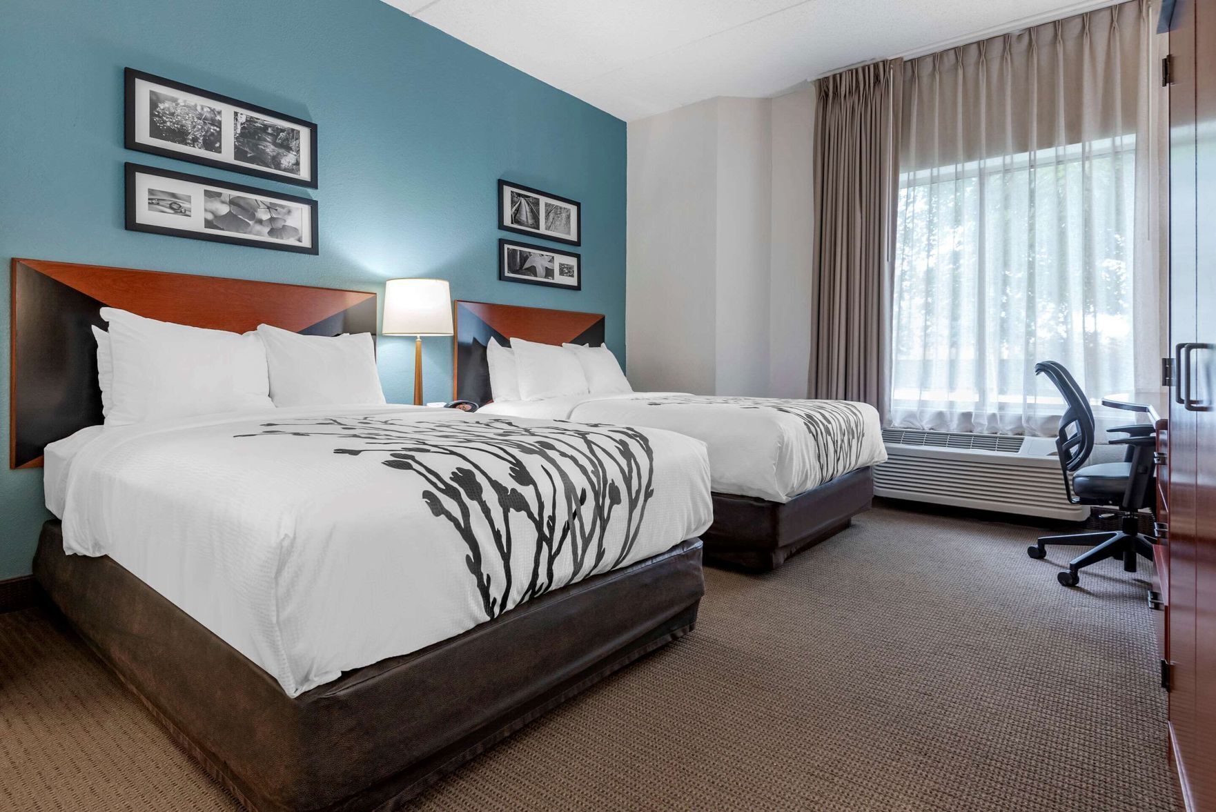 Desk, blackout drapes, iron/ironing board, free cribs/infant beds